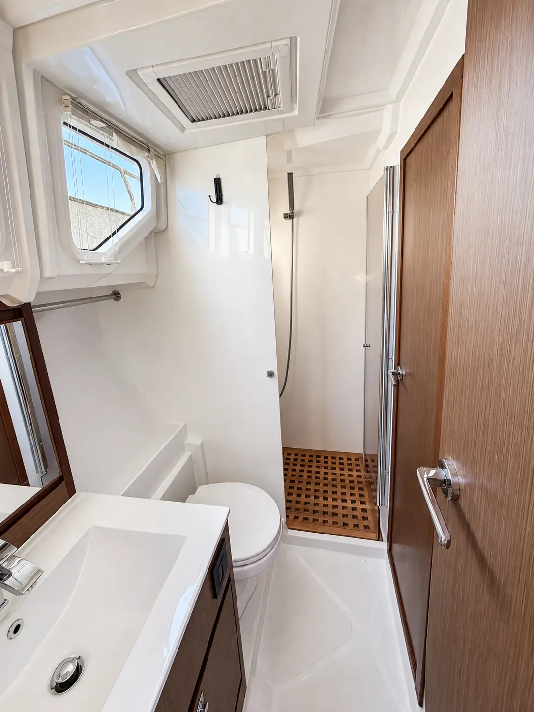 Head with vanity and separate teak grate shower