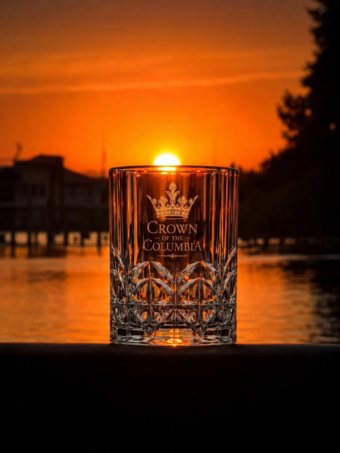 Crown of the Columbia engraved crystal glass lit by the sunset
