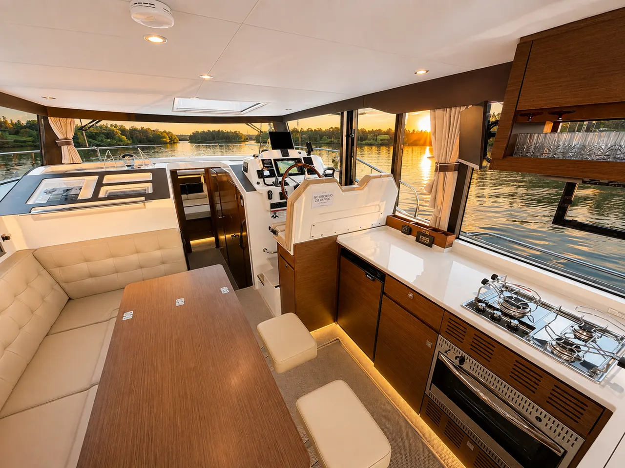 Second-deck galley and salon at sunset