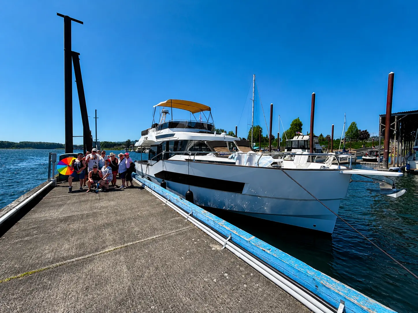 Crown of the Columbia alongside the dock with guests on the pier