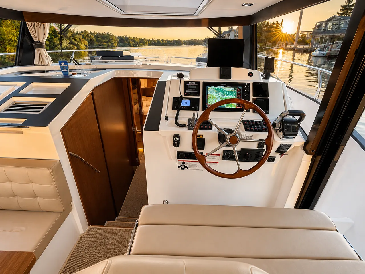Helm station with wide windows and river views